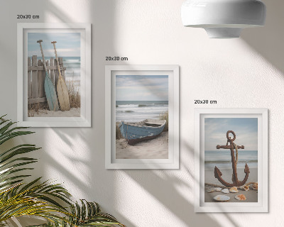 Photo frame wall A beach with a rowboat and an anchor in the sand