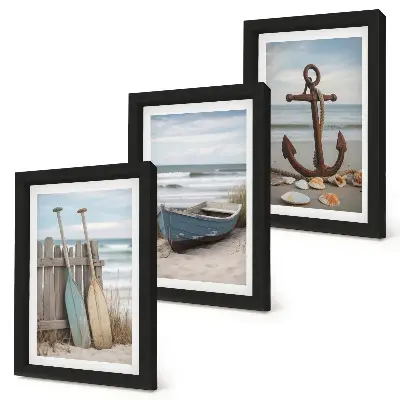 Photo frame wall a beach scene with a rowboat and an anchor in the sand