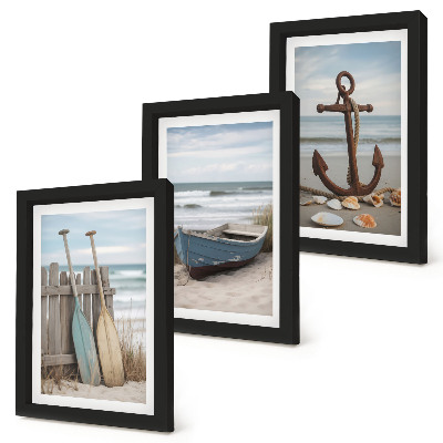 Photo frame wall A beach with a rowboat and an anchor in the sand