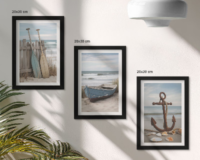 Photo frame wall A beach with a rowboat and an anchor in the sand