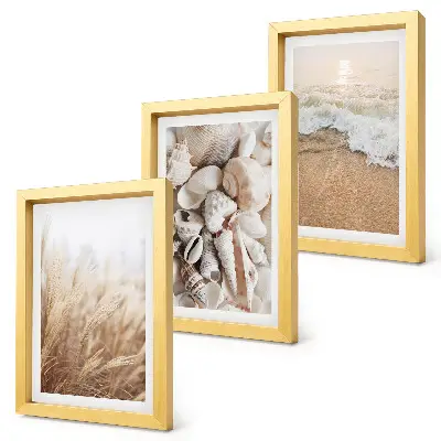 Photo frame wall with beach, shell, and sea wave motifs