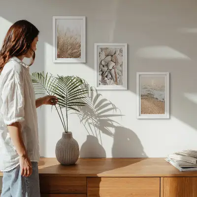 Photo frame wall with beach, shell, and sea wave motifs