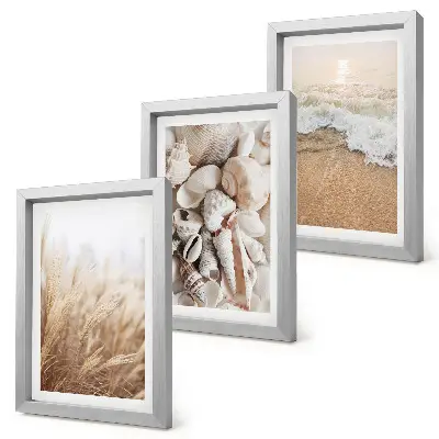 Photo frame wall with beach, shell, and sea wave motifs