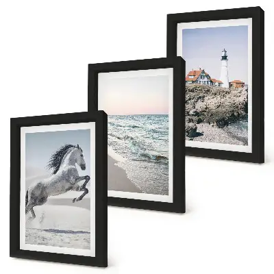 Photo frame wall featuring horses in motion on a beach with a lighthouse and water waves