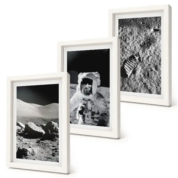Photo frame wall with moon, astronaut, and footprint prints
