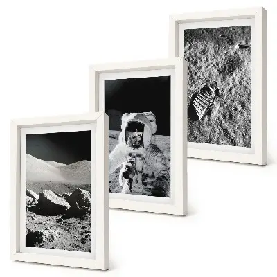 Photo frame wall with moon, astronaut, and footprint prints