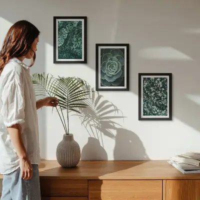 Photo frame wall with green succulent leaves and delicate twigs