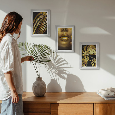 Framed triptych Palm leaves woman's face monstera leaves