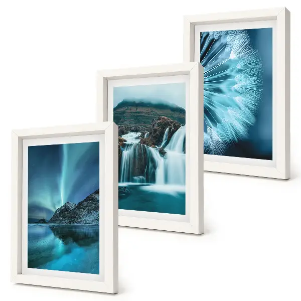 Photo frame wall with winter landscapes showing waterfalls and aurora borealis