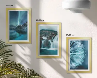 Photo frame wall with winter landscapes showing waterfalls and aurora borealis