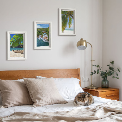 Framed triptych Beach with boat, waterfalls and palm trees in the tropics