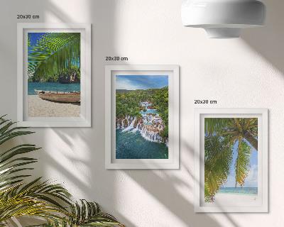 Framed triptych Beach with boat, waterfalls and palm trees in the tropics