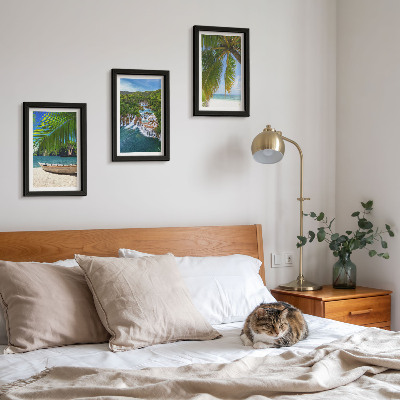 Framed triptych Beach with boat, waterfalls and palm trees in the tropics