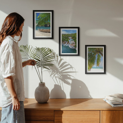 Framed triptych Beach with boat, waterfalls and palm trees in the tropics