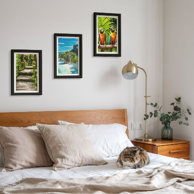 Photo frame wall Tropical forest with a waterfall and colorful parrots