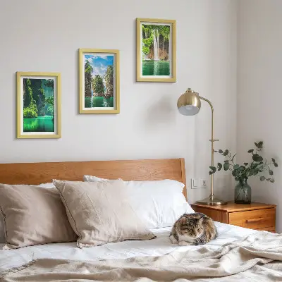 Green landscapes with waterfalls and rocks framed triptych
