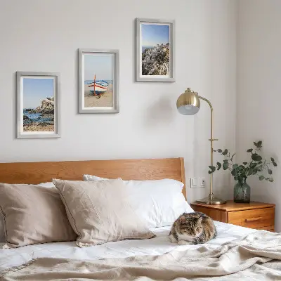 3-piece wall art set seaside view with boat and white houses in Greece