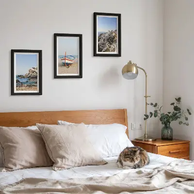 3-piece wall art set seaside view with boat and white houses in Greece