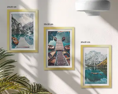 A lake with wooden piers and mountains framed triptych