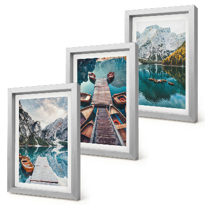 Framed triptych A lake with wooden piers and mountains