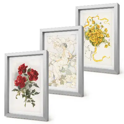 Photo frame wall with a display of red roses, a white figure, and yellow flowers in a vase