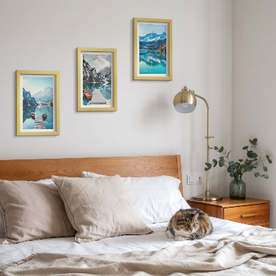 Framed triptych Mountain lakes with boats and reflections in the water