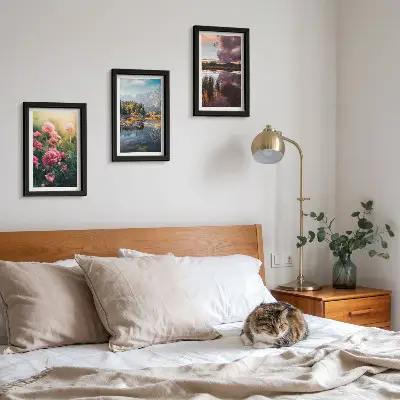Photo frame wall featuring flowers in a garden, mountains, and a calm water surface