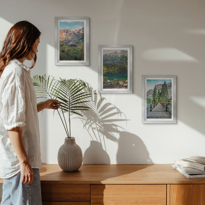 Framed triptych Mountain landscapes with a lake and a wooden pier