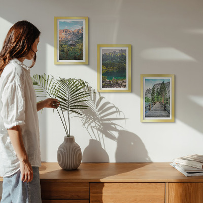 Framed triptych Mountain landscapes with a lake and a wooden pier