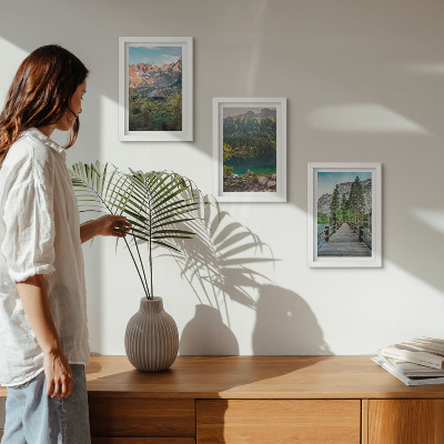 Framed triptych Mountain landscapes with a lake and a wooden pier