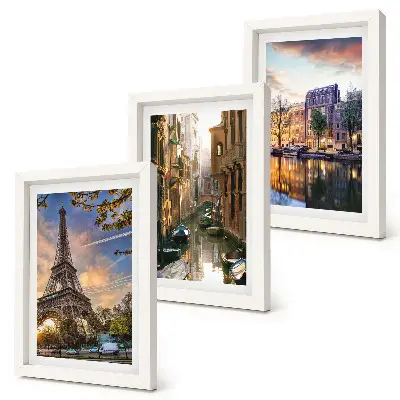 Photo frame wall featuring the Eiffel Tower, the canals of Venice, and the streets of Amsterdam