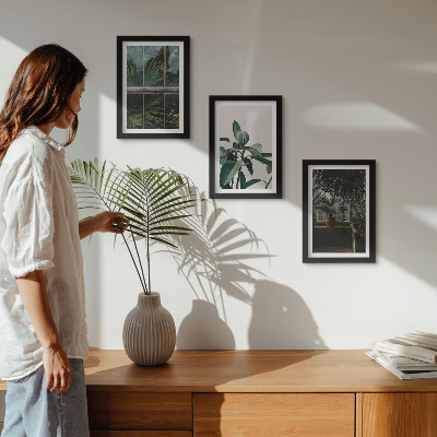 Framed triptych Green leaves on the window and plants inside