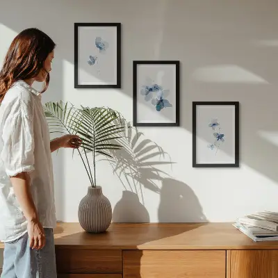 3-piece wall art set flowers in blue shades on a light background