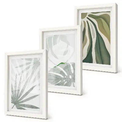 Photo frame wall with green and gray plant leaves