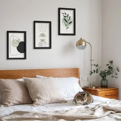 Photo frame wall with abstract shapes and plant motifs in green