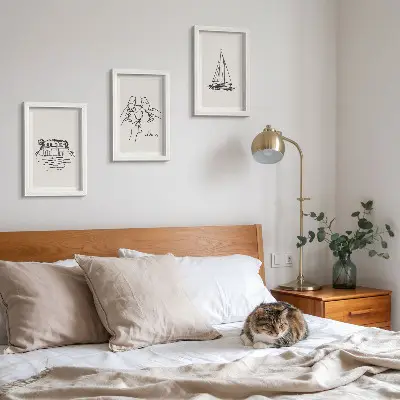 Photo frame wall featuring views of a house by the water with toast, glasses, and a sailboat
