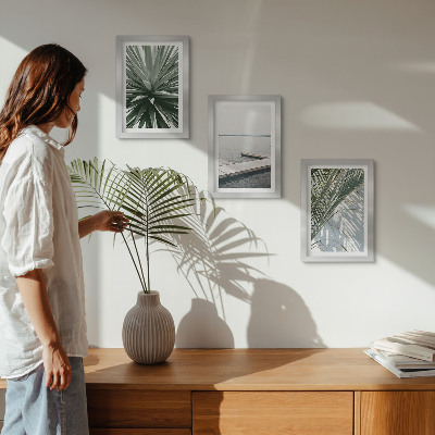 Photo frame wall Palm leaves plant and wooden bridge