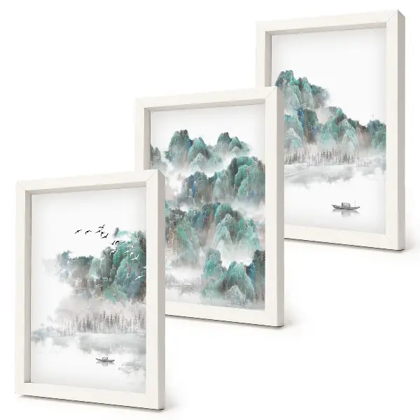 Framed triptych mountains in the clouds with birds and a boat on the water in Japandi style