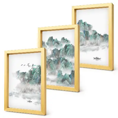 Framed triptych mountains in the clouds with birds and a boat on the water in Japandi style