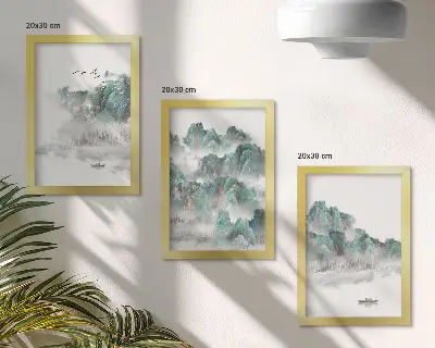 Framed triptych mountains in the clouds with birds and a boat on the water in Japandi style