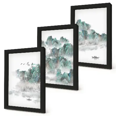 Framed triptych mountains in the clouds with birds and a boat on the water in Japandi style
