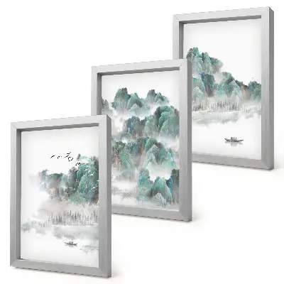 Framed triptych mountains in the clouds with birds and a boat on the water in Japandi style