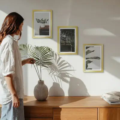 Potted plants with rustic leaves framed triptych