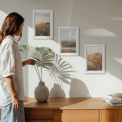 Framed triptych Landscapes with meadows, mountains and a lake in the background