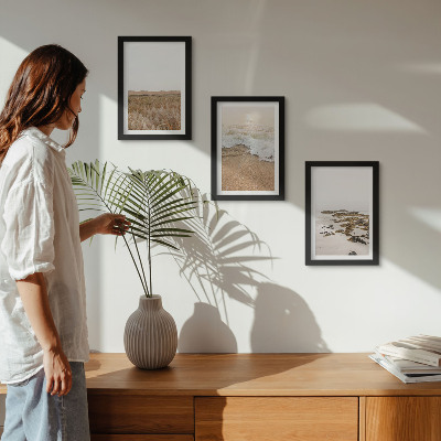 Photo frame wall Beach with waves and sea stones in summer