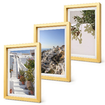 Photo frame wall White stairs in Santorini with a view of the town