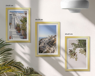 Photo frame wall White stairs in Santorini with a view of the town
