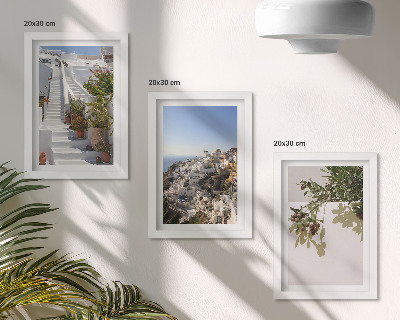 Photo frame wall White stairs in Santorini with a view of the town