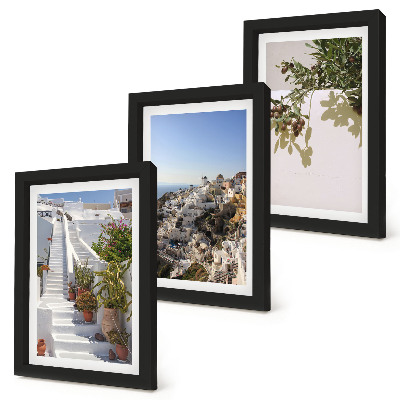 Photo frame wall White stairs in Santorini with a view of the town