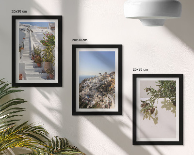 Photo frame wall White stairs in Santorini with a view of the town